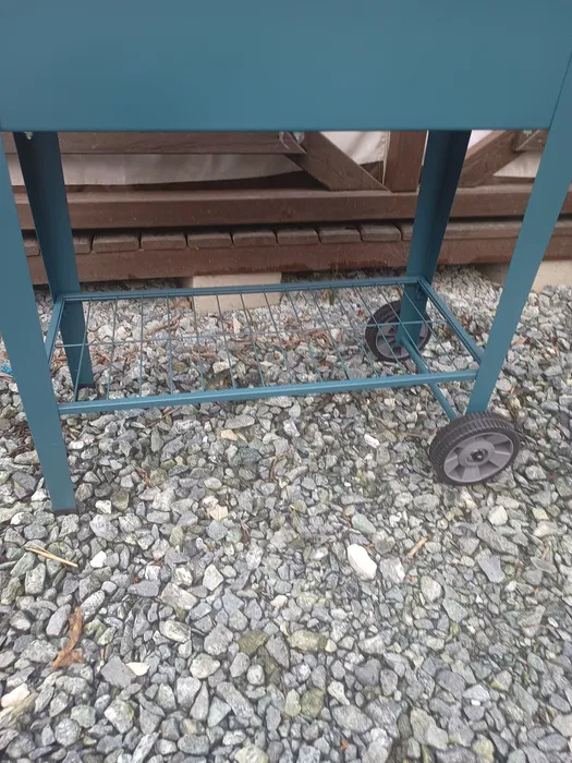 Ciemnozielony metalowy mobilny wózek donica na sadzonki i zioła na kółkach 84,5x45 cm