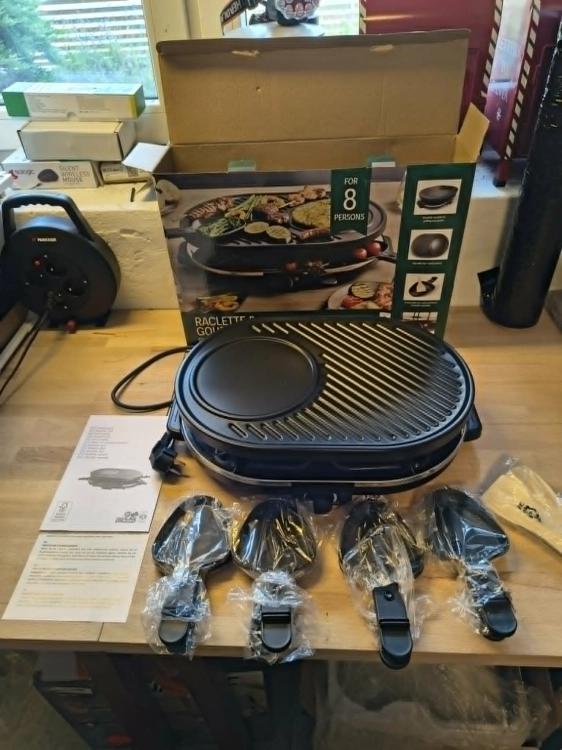 Zielono-biały oryginalny karton z grillem elektrycznym Raclette Gourmet Set 42x29 cm