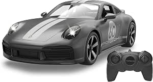 Nowe fabrycznie zapakowane szare zdalnie sterowane auto Porsche Sport Classic marki Rastar w skali 1 do 16 z widocznymi wgnieceniami na pudełku