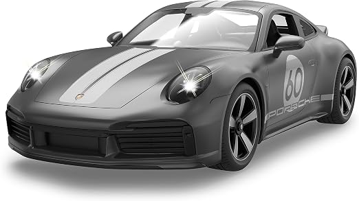 Nowe fabrycznie zapakowane szare zdalnie sterowane auto Porsche Sport Classic marki Rastar w skali 1 do 16 z widocznymi wgnieceniami na pudełku