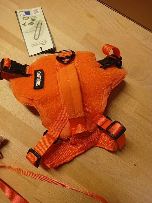 Nowy pomarańczowy taktyczny zestaw dla małego psa OneTigris Mini Trooper w rozmiarze XS zawierający szelki z uchwytem i panelami na naszywki oraz pasującą smycz