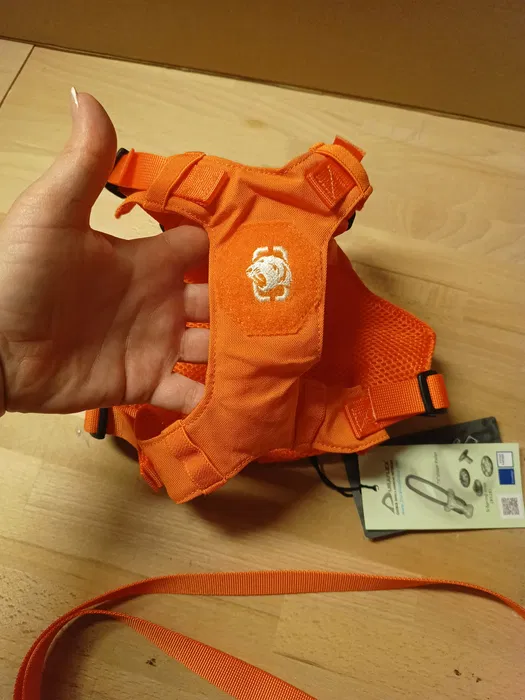 Nowy pomarańczowy taktyczny zestaw dla małego psa OneTigris Mini Trooper w rozmiarze XS zawierający szelki z uchwytem i panelami na naszywki oraz pasującą smycz