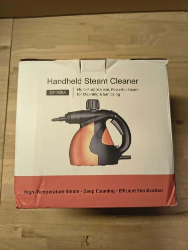 Nowe oryginalne opakowanie kartonowe ręcznej myjki parowej Handheld Steam Cleaner model DF-928A z grafiką pomarańczowo czarnej parownicy