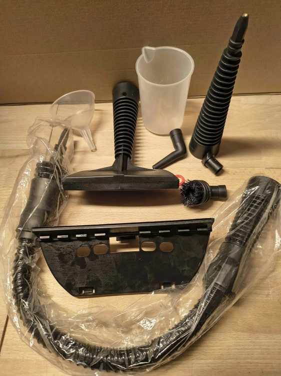 Nowe oryginalne opakowanie kartonowe ręcznej myjki parowej Handheld Steam Cleaner model DF-928A z grafiką pomarańczowo czarnej parownicy